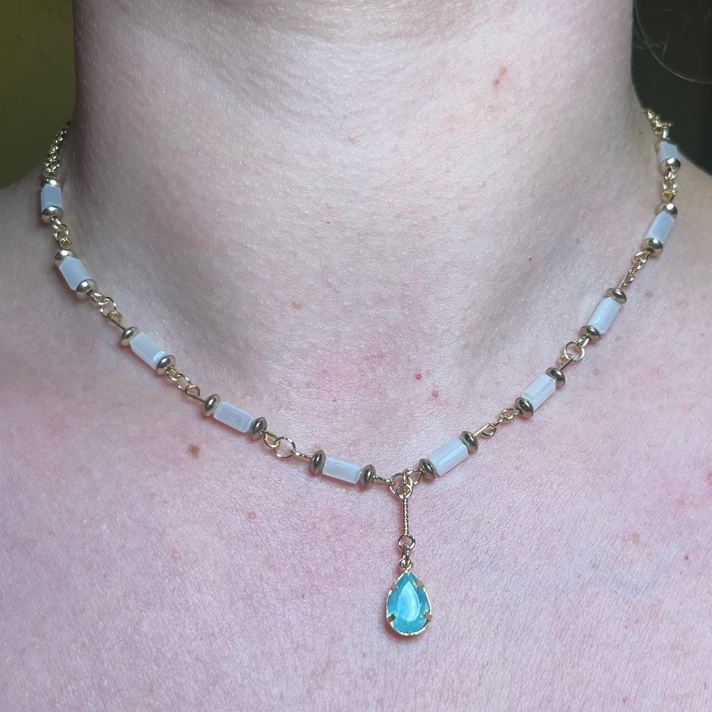 Mermaid Teardrop: White and Gold Beaded Necklace with Light Blue Jewel Pendant