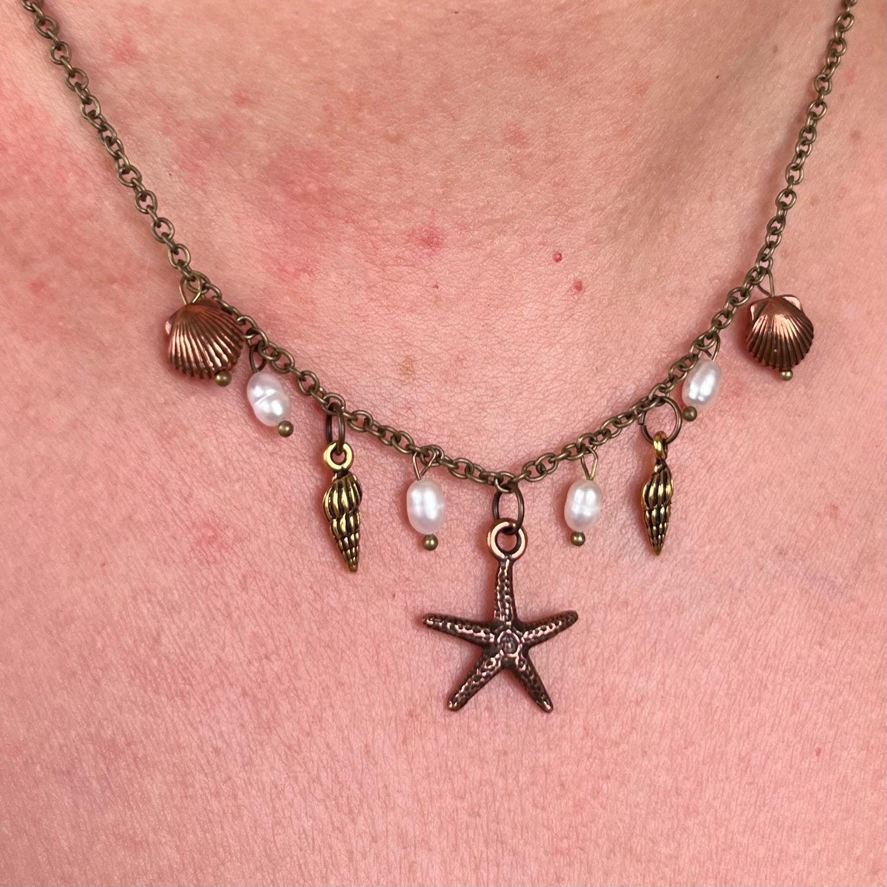 Ocean Treasures Necklace: Starfish and Shell Pendants with Freshwater Pearls