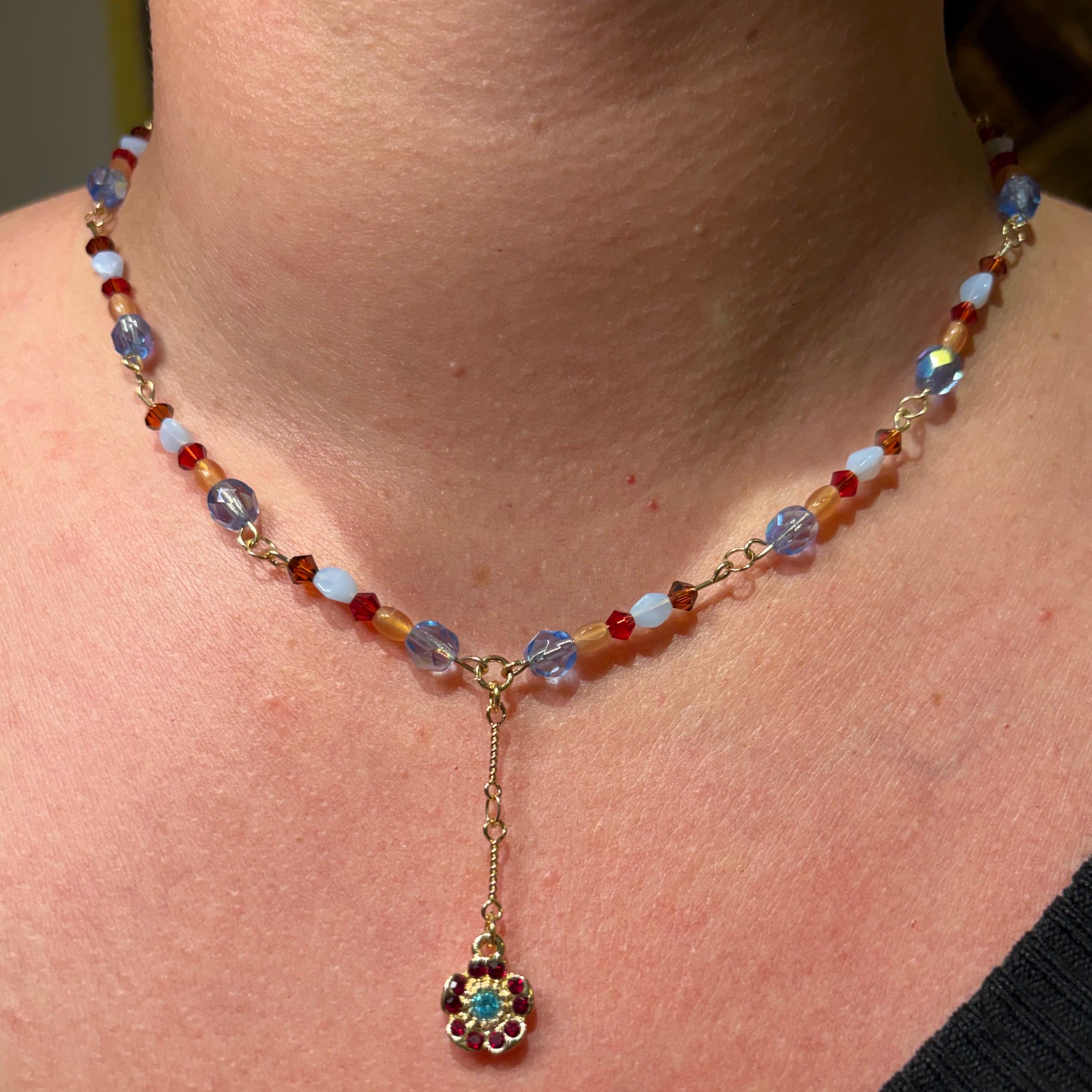 Gypsy Garland: Sparkly Blue and Red Garnet Swarovski Beads with Red and Blue Flower Pendant