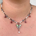 Winged Whisper: Opaline Dragonfly Necklace with Flower Beading