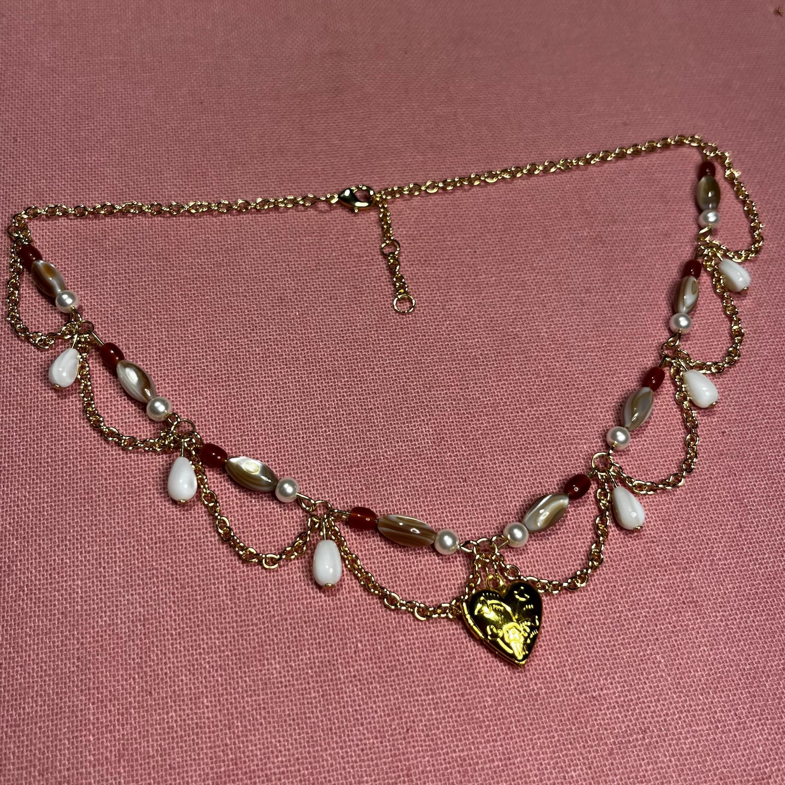 Darling Dynasty: Gold Heart Locket Necklace with Gold Chain and White/Amber Beading