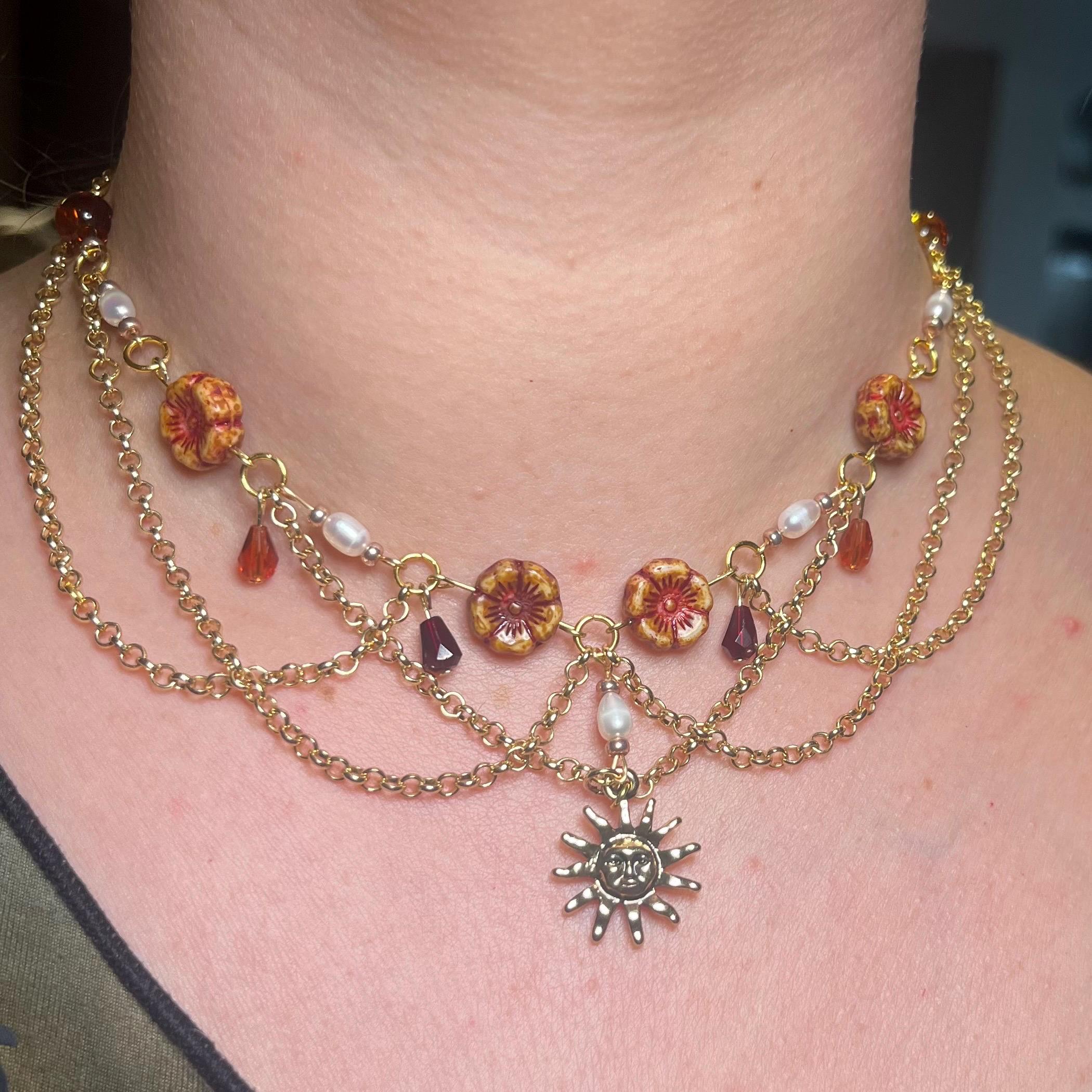 Amber Sol: Orange, Maroon, Sun Choker with Gold Chain