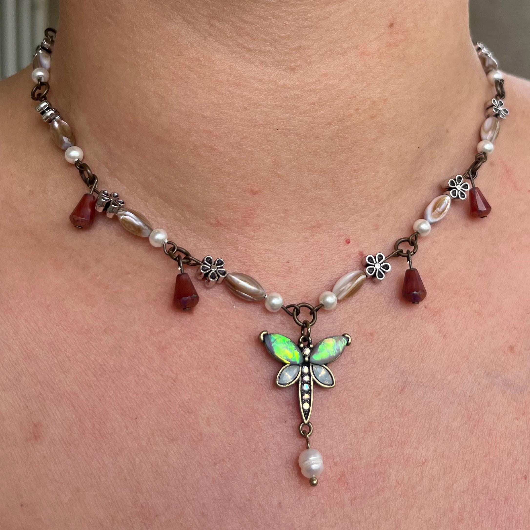 Winged Whisper: Opaline Dragonfly Necklace with Flower Beading