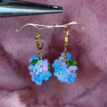 Pixie Pedals Hoop Earrings: Blue and Purple Flower Cluster Dangle Hoop Earrings