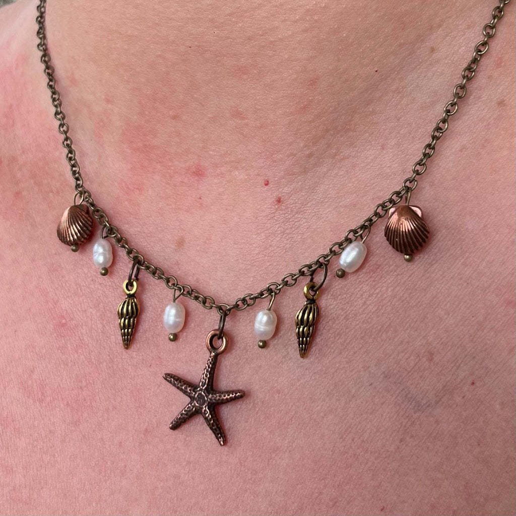 Ocean Treasures Necklace: Starfish and Shell Pendants with Freshwater Pearls