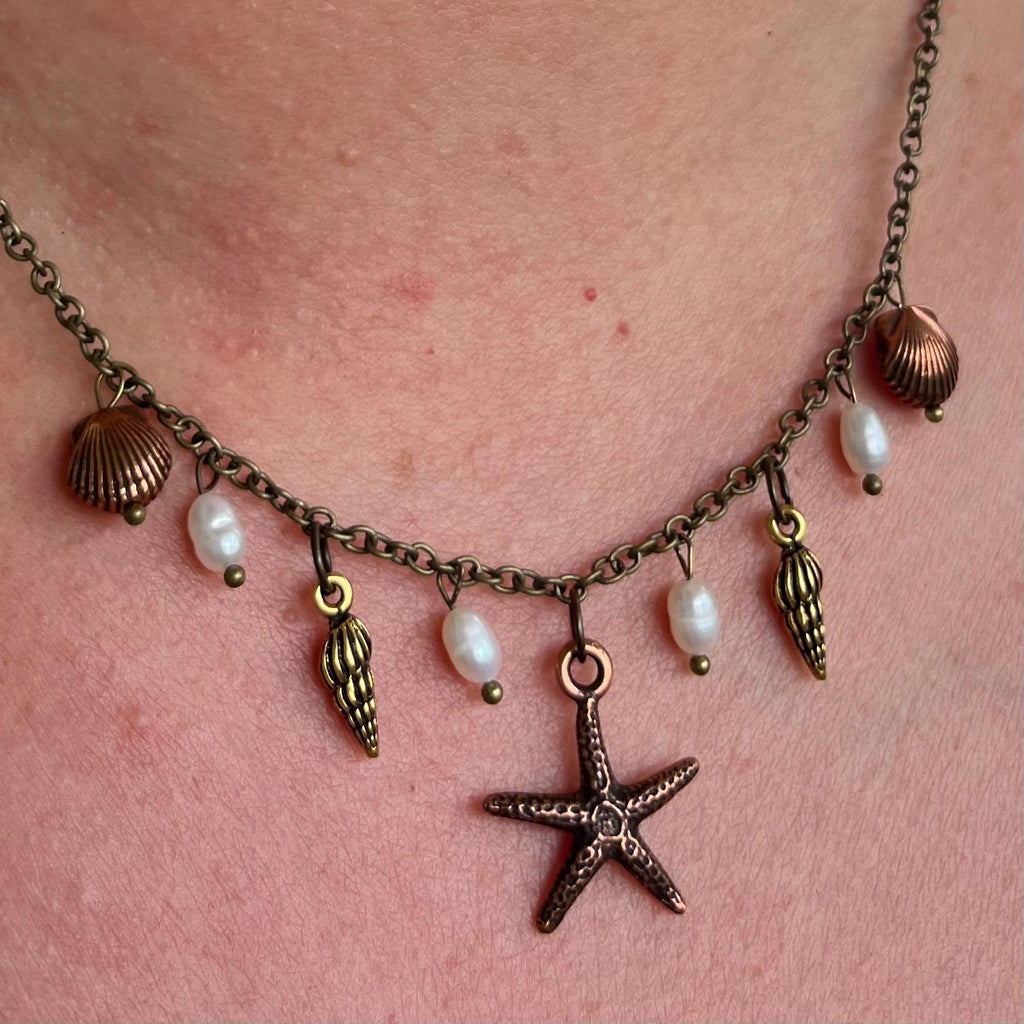 Ocean Treasures Necklace: Starfish and Shell Pendants with Freshwater Pearls