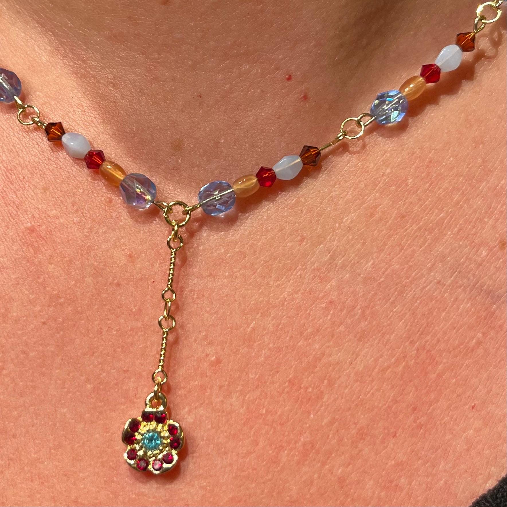 Gypsy Garland: Sparkly Blue and Red Garnet Swarovski Beads with Red and Blue Flower Pendant