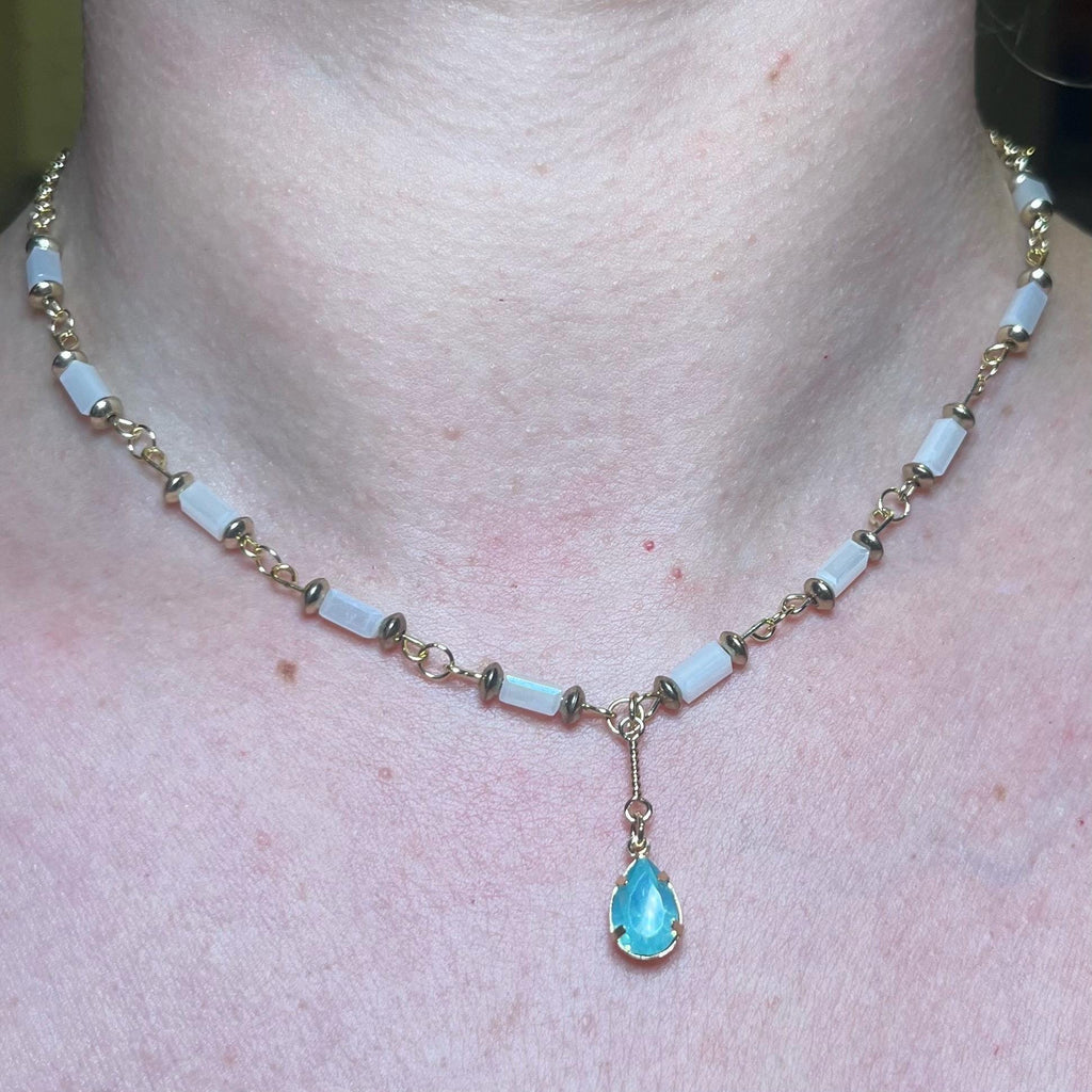 Mermaid Teardrop: White and Gold Beaded Necklace with Light Blue Jewel Pendant