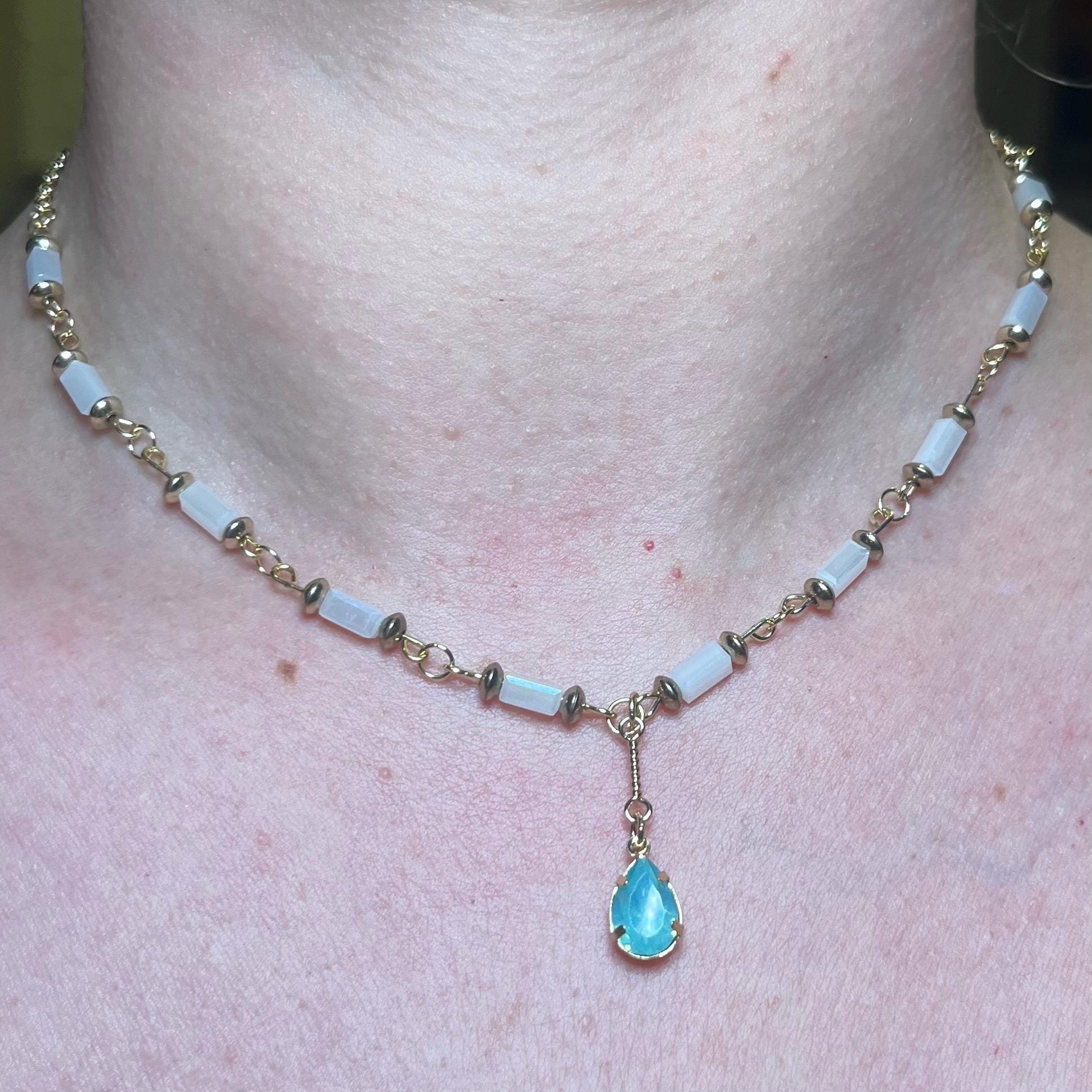 Mermaid Teardrop: White and Gold Beaded Necklace with Light Blue Jewel Pendant