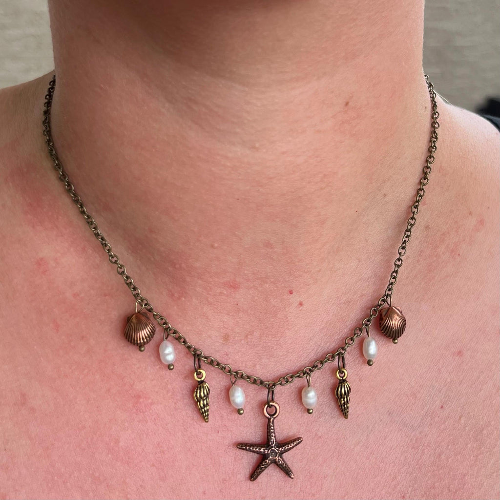 Ocean Treasures Necklace: Starfish and Shell Pendants with Freshwater Pearls