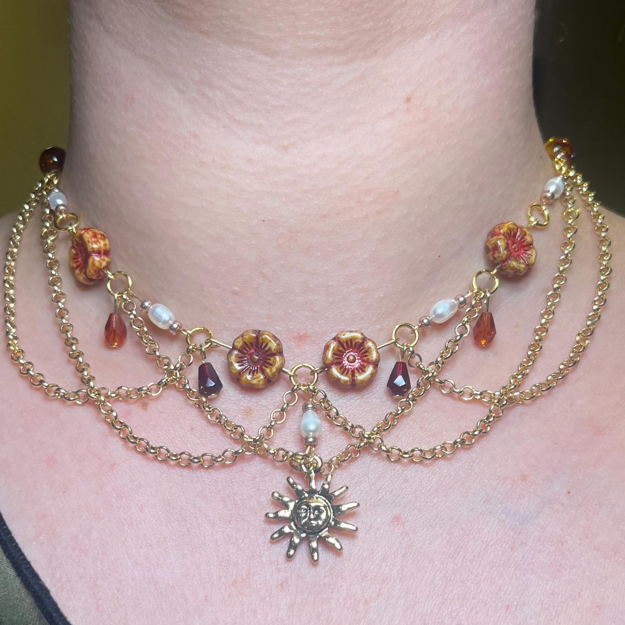 Amber Sol: Orange, Maroon, Sun Choker with Gold Chain