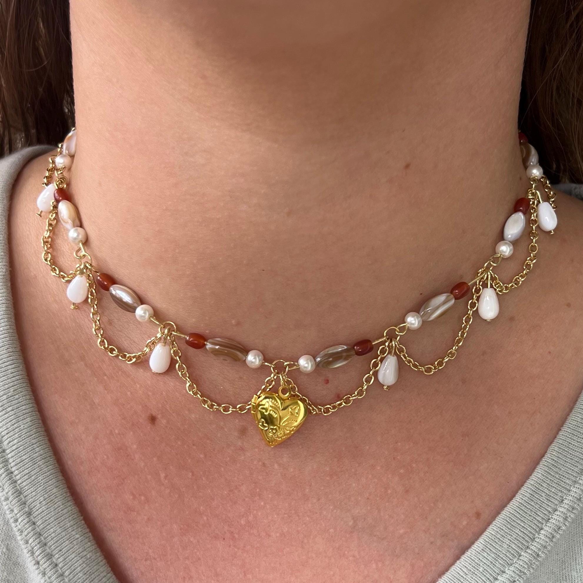Darling Dynasty: Gold Heart Locket Necklace with Gold Chain and White/Amber Beading