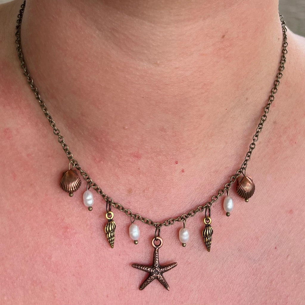 Ocean Treasures Necklace: Starfish and Shell Pendants with Freshwater Pearls