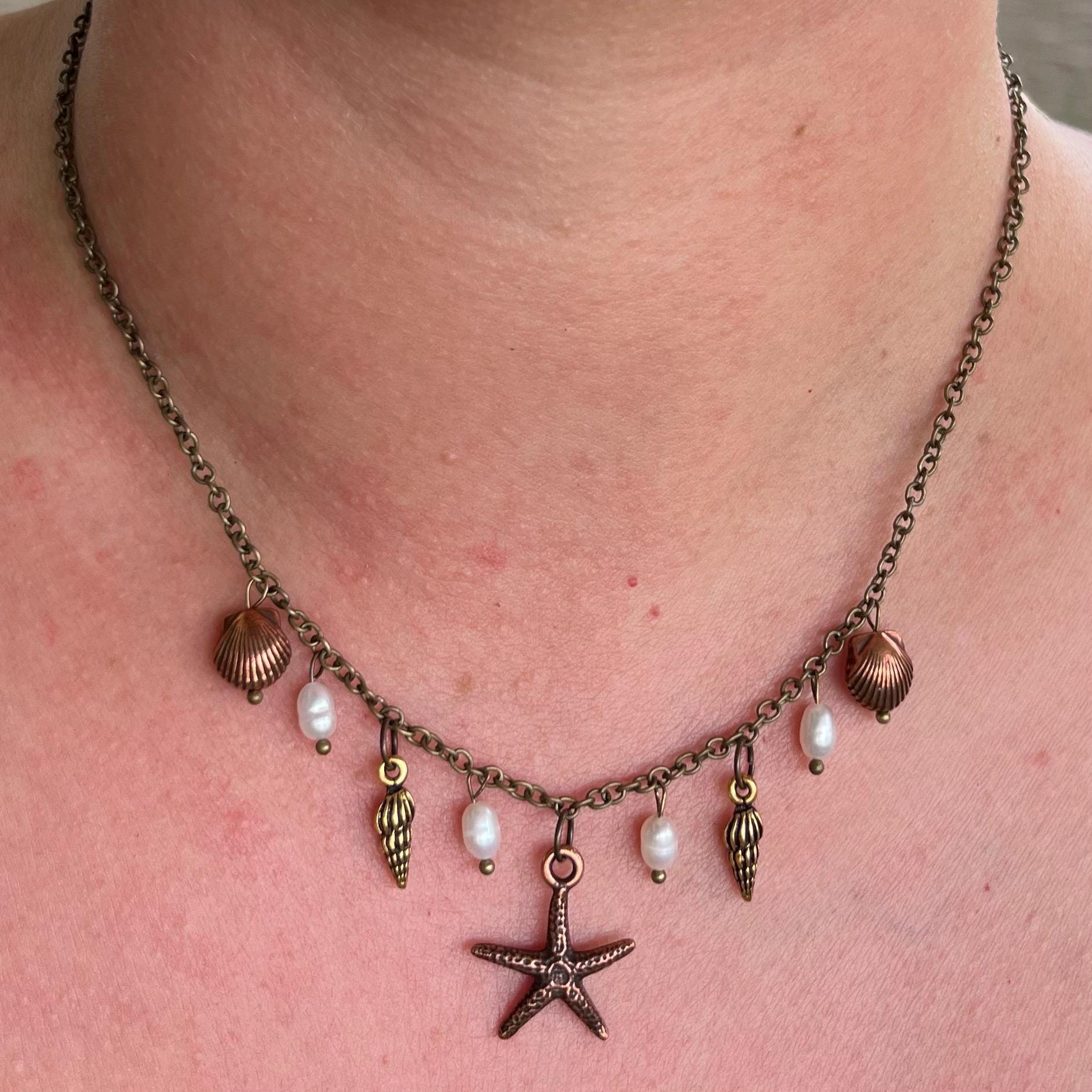 Ocean Treasures Necklace: Starfish and Shell Pendants with Freshwater Pearls