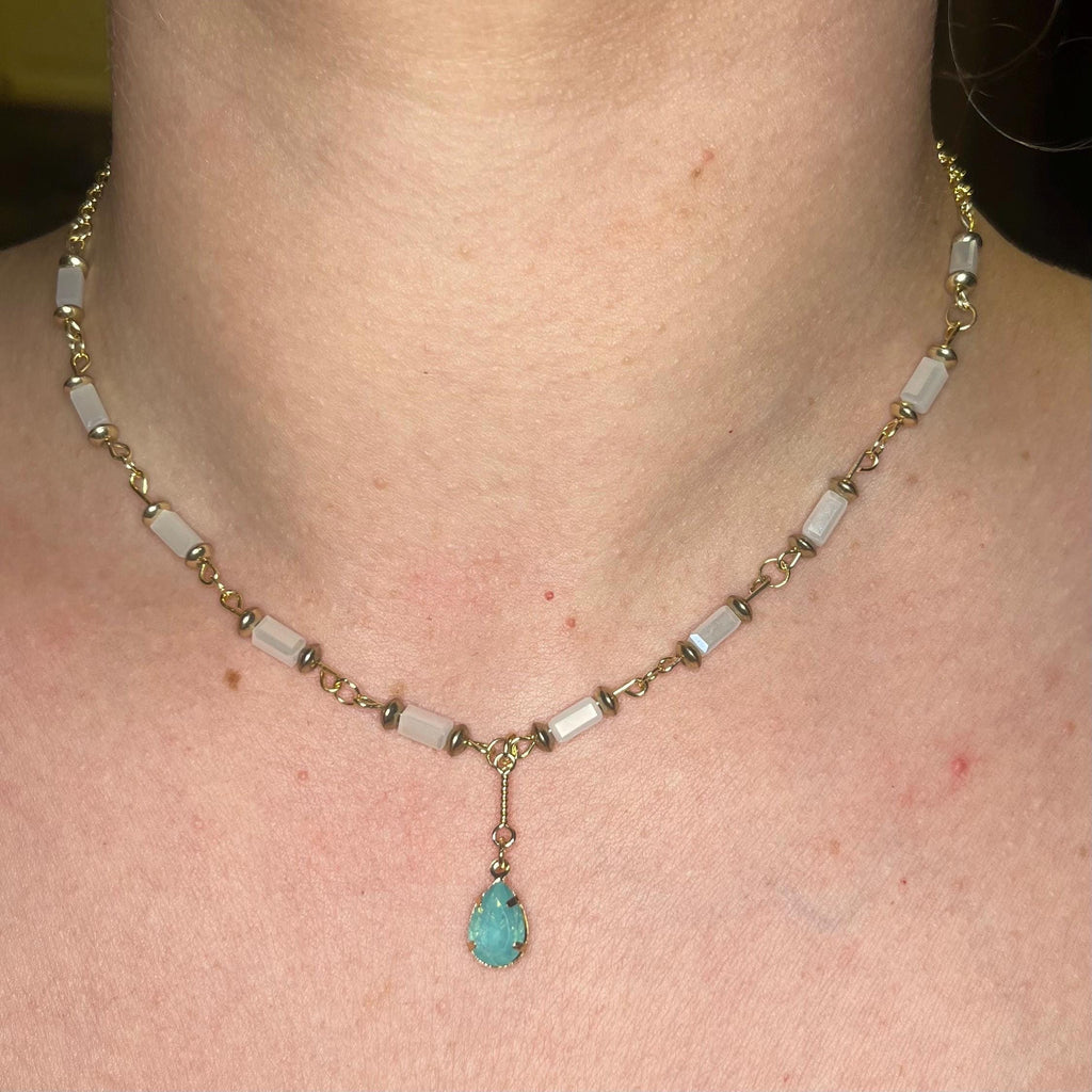 Mermaid Teardrop: White and Gold Beaded Necklace with Light Blue Jewel Pendant