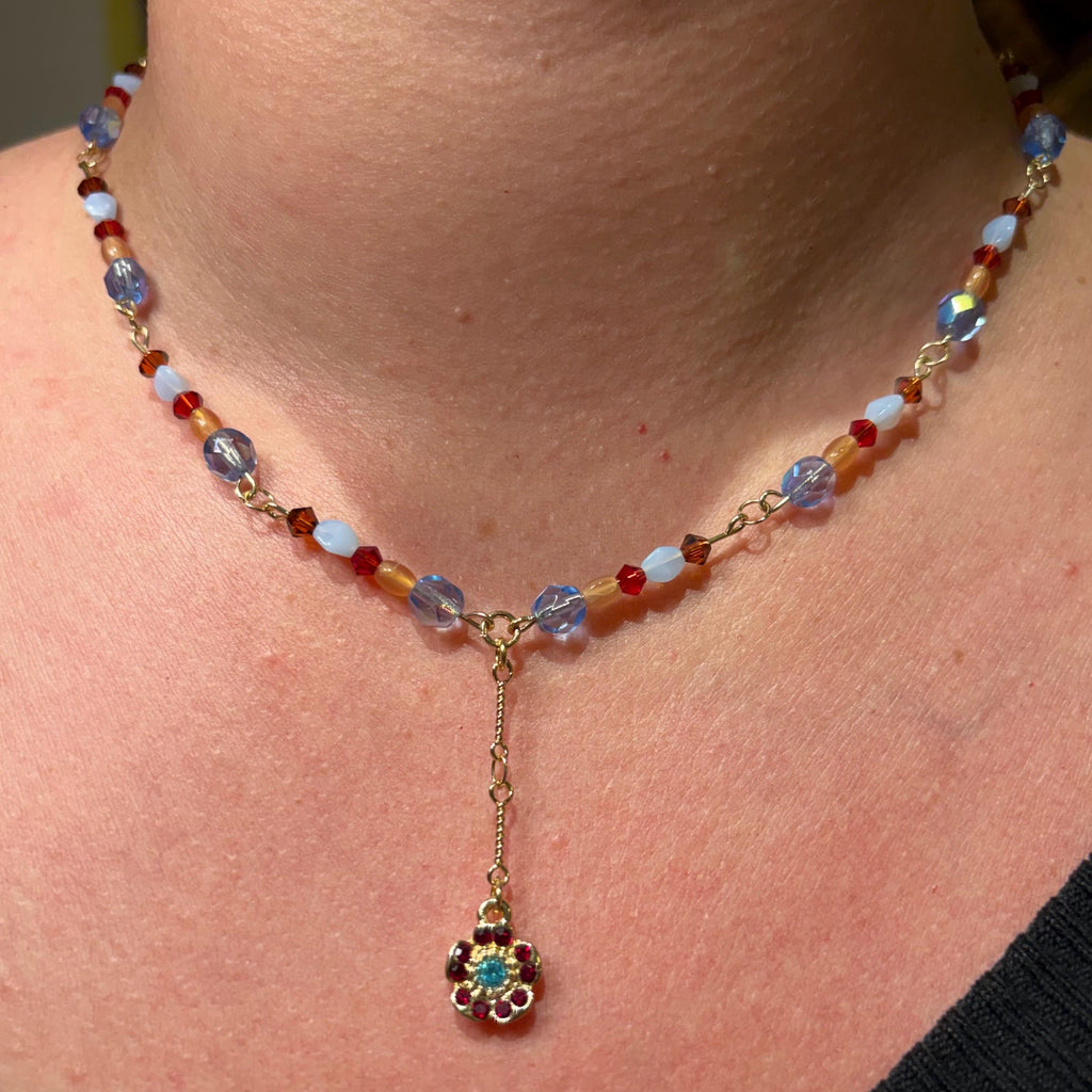 Gypsy Garland: Sparkly Blue and Red Garnet Swarovski Beads with Red and Blue Flower Pendant